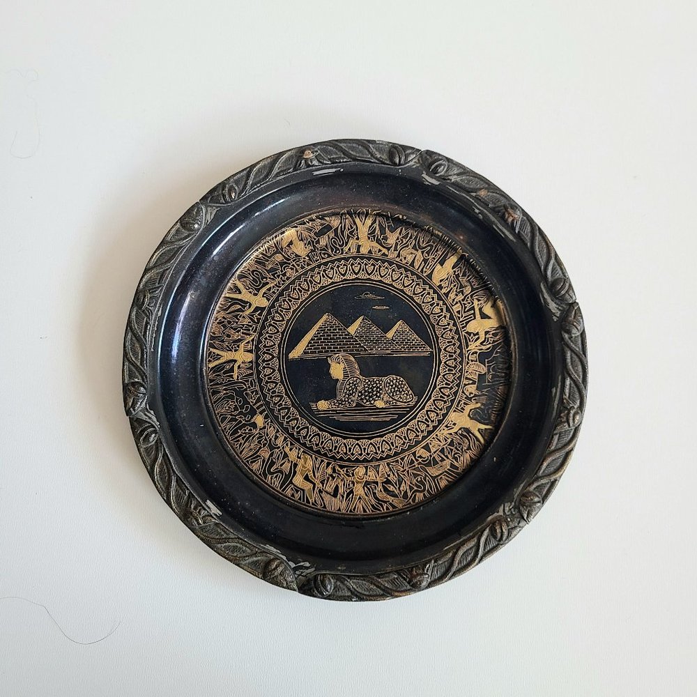Vintage Egyptian metal plate wall hanger with pyramids and Sphinx.